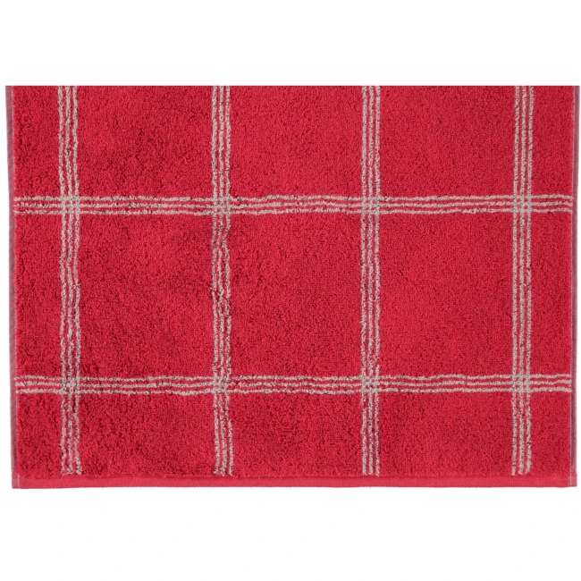 Ręcznik bawełniany 80x150 cm w kolorze bordowym, z szaro-białym wzorem kratki. Widoczny w poziomie, z bliska, ukazujący strukturalną fakturę materiału. Tło jednolite, podkreślające kolor i wzór ręcznika.