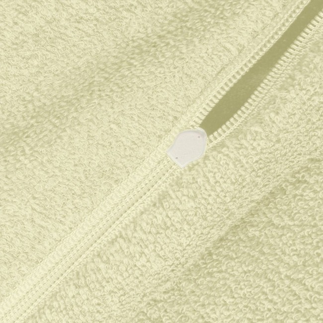 Pościel frotte 160x200 w kolorze kremowym, widoczny suwak z białą końcówką, faktura materiału z miękkim, puszystym wykończeniem, rozłożona na płaskiej powierzchni. Idealna do aranżacji sypialni.