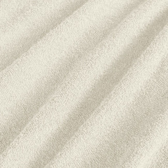 Pościel frotte 200x220 w kolorze ecru, z teksturowanym, przyjemnym w dotyku materiałem. Złożona, ukazuje miękki splot tkaniny. Widoczne delikatne wzory, na jasnym tle, co podkreśla jej elegancki wygląd. Idealna do nowoczesnej sypialni.
