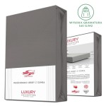 Prześcieradło jersey z elastanem w kolorze antracytowym, z gumką, rozmiar 180x200 cm, zapakowane w estetyczne pudełko. Widoczna informacja na froncie opakowania wskazująca na kolekcję Luxury oraz wysoka gramatura materiału 160 g/m².