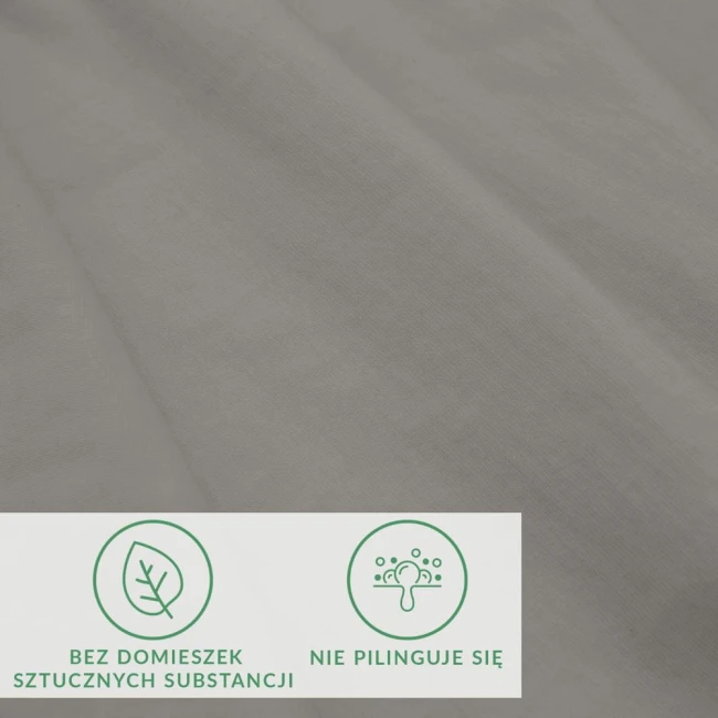 Prześcieradło jersey z elastanem w kolorze popielatym, rozmiar 200x220 cm, leżące na białym tle. Widoczna faktura materiału, z logo i oznaczeniami: bez domieszek sztucznych substancji oraz nie pilinguje się.