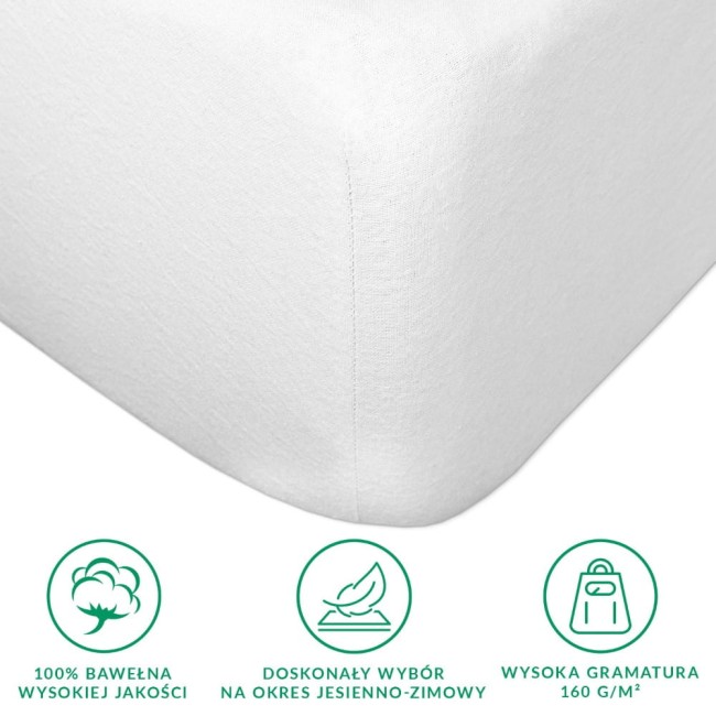 Prześcieradło flanelowe z gumką w kolorze białym, o wymiarach 160x200 cm, wykonane z 100% bawełny. Zbliżenie na rogi prześcieradła, ukazujące gumkę i fakturę materiału. Widoczne symbole dotyczące jakości oraz zastosowania na okres jesienno-zimowy.
