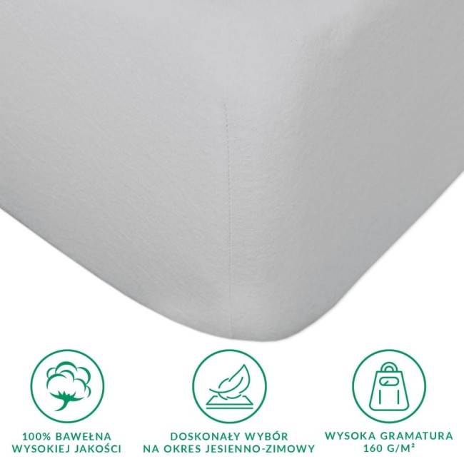 Prześcieradło flanelowe z gumką w kolorze jasno szarym, rozmiar 180x200 cm. W widoku frontalnym widać narożniki oraz teksturę materiału. Widoczne oznaczenia w dolnej części: 100% bawełna, zalecenia dotyczące użytkowania, wysoka gramatura 160 g/m².