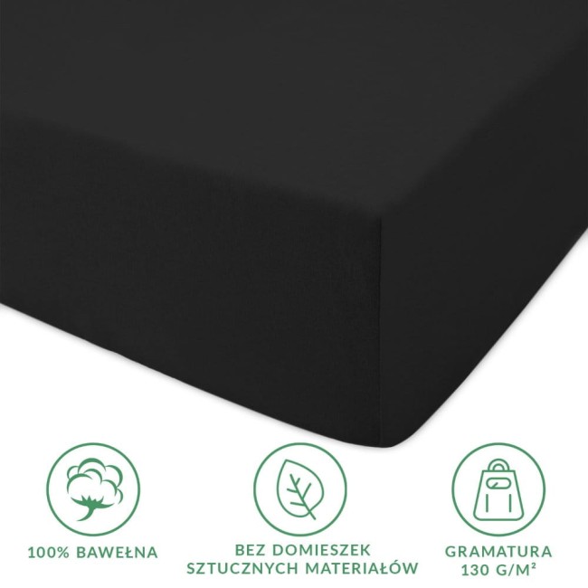 Prześcieradło jersey z gumką 140x200 w kolorze czarnym, wykonane z 100% bawełny, gładkie i rozłożone na płaskiej powierzchni. Widoczne oznaczenia dotyczące materiału oraz gramatury, bez dodatkowych ozdobników.
