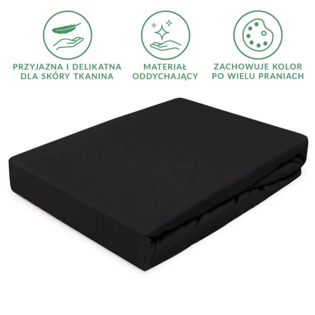 Prześcieradło jersey z gumką 90x200 w kolorze czarnym, leżące na białym tle. Widać gładką fakturę materiału. Krawędzie prześcieradła są lekko rozłożone, a gumka jest widoczna, co zapewnia dobre dopasowanie. Idealne dla łóżek o wymiarach 90x200 cm.