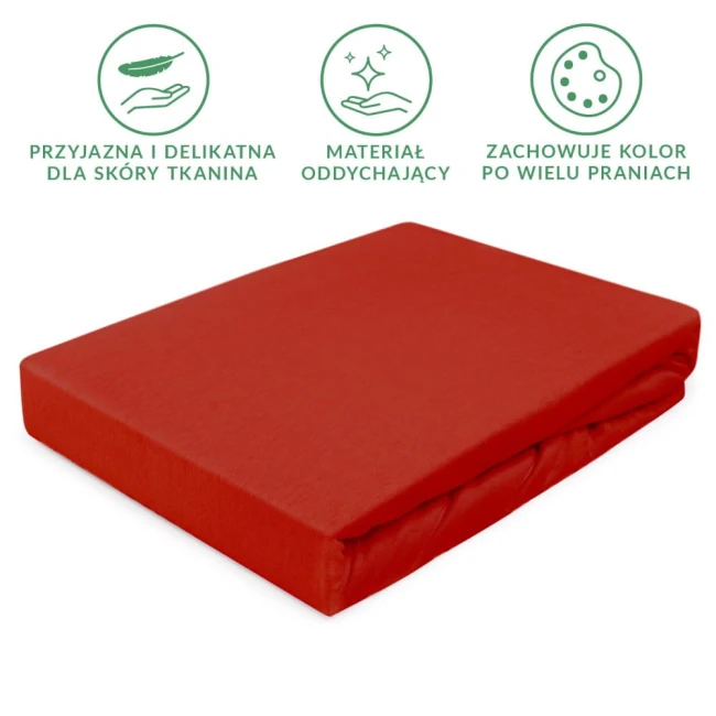 Prześcieradło jersey z gumką 160x200 w intensywnym czerwonym kolorze, leżące na płaskiej powierzchni. Materiał jest gładki, elastyczny i oddychający. Produkt jest złożony, ukazując równy kształt i brzeg z gumką.
