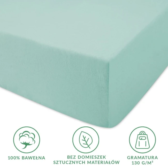 Prześcieradło jersey z gumką 180x200 w jasnym turkusie, wykonane z 100% bawełny. Produkt leży na płaskiej powierzchni, ukazując naddatek materiału. Widoczne symbole dotyczące składu, ekologii i gramatury. Brak widocznych napisów lub logo.