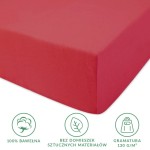 Prześcieradło jersey z gumką 40x90 w kolorze koralowym, wykonane z 100% bawełny. Produkt leży na gładkim tle, ukazując bok z dokładnym dopasowaniem do materaca. Widoczne informacje o braku domieszek sztucznych materiałów oraz gramaturze 130 g/m².