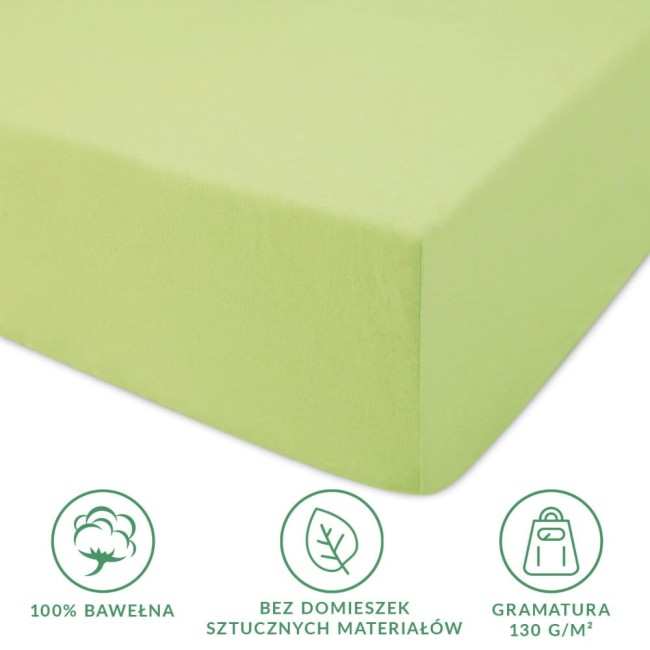 Prześcieradło jersey z gumką 200x220 w kolorze limonkowym, wykonane z 100% bawełny. Ułożone leżąco, ukazuje gładką, teksturowaną powierzchnię. Widoczne symbole dotyczące braku sztucznych domieszek oraz gramatury 130 g/m².