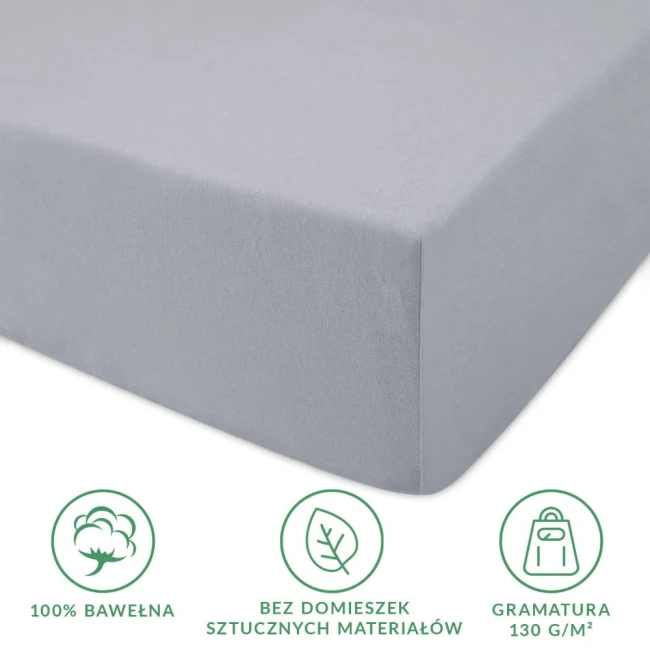 Prześcieradło jersey z gumką w kolorze popielatym, wykonane w 100% z bawełny, z gramaturą 130 g/m². Produkt rozłożony, ukazujący fakturę materiału i elastyczne wykończenie na krawędzi.