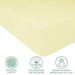 Prześcieradło frotte z gumką 90x200 w kolorze kremowym, z widoczną fakturą materiału. Ujęcie z boku, produkt leżący, z gładką powierzchnią. Widoczna informacja o składzie: 82% bawełna i 18% poliester, oraz wysoka gramatura 155 g/m².