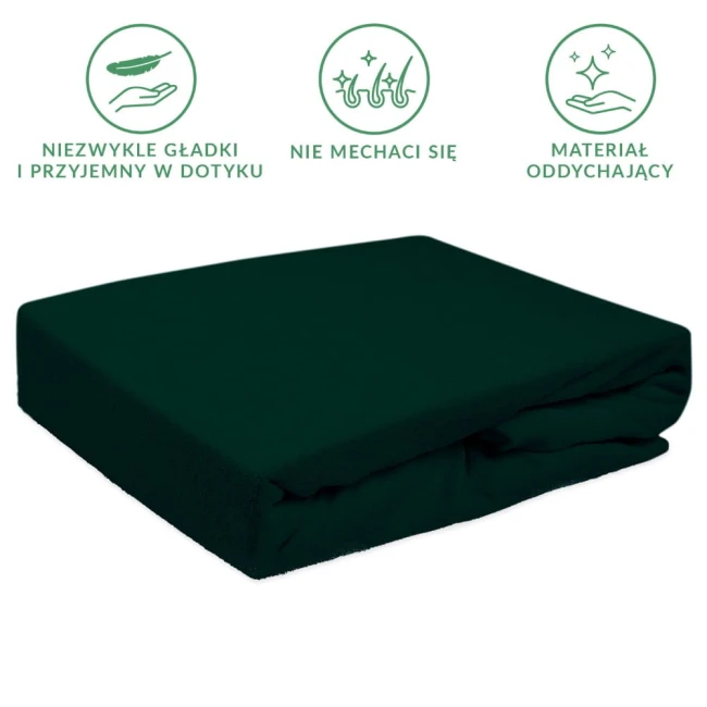 Prześcieradło frotte z gumką w kolorze zieleni butelkowej, rozmiar 90x200 cm, leżące na neutralnym tle. Wysoka jakość materiału, gładka faktura, gumka zapewniająca lepsze dopasowanie. Produkt bez wzorów, z uniwersalnym zastosowaniem.