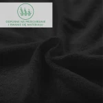 Prześcieradło frotte z gumką w kolorze czarnym, wykonane z miłego w dotyku materiału. Zbliżenie na teksturę, ukazujące gładką i miękką powierzchnię. Widoczna informacja o odporności na przecieranie i rwanie się materiału.