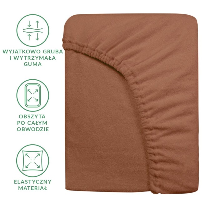 Prześcieradło frotte z gumką w kolorze czekoladowym, rozmiar 120x200 cm, leżące na jednolitym tle. Materiał charakteryzuje się miękką teksturą, a gumka jest mocno obdziana wokół całego obwodu, co zapewnia lepsze przyleganie.
