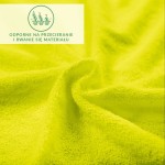 Prześcieradło frotte z gumką w kolorze limonki, rozmiar 120x200 cm. Materiał o teksturze pętlicowej, elastyczne, układające się w falę, na jednolitym tle. Widoczna informacja o odporności na przetarcia i rwanie.