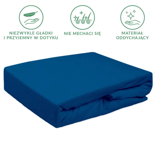 Prześcieradło frotte z gumką 140x200 w kolorze chabru, leżące na płaskiej powierzchni, z widoczną teksturą materiału. Złożone, jednocześnie widać elastyczną gumkę na brzegach zapewniającą dobre dopasowanie do materaca.