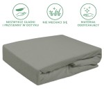Prześcieradło frotte z gumką 140x200 w kolorze szarym, leżące na płasko. Wykonane z miękkiego, oddychającego materiału, z gładką fakturą. Widoczne złożenie wzdłuż krawędzi. Idealne do łóżek o wymiarach 140x200 cm.