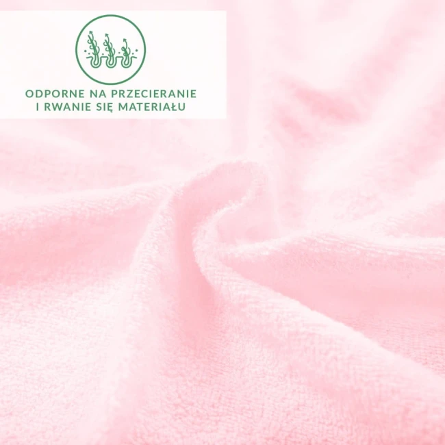 Prześcieradło frotte z gumką w kolorze róż kwarcowy, o wymiarach 160x200 cm. Widoczna tekstura materiału, delikatne fałdy. Produkt odporny na przecieranie i rwanie się materiału.
