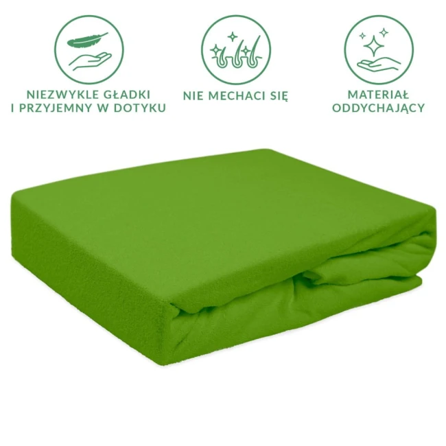 Prześcieradło frotte z gumką w kolorze kaktus, rozmiar 180x200, zwinięte, o gładkiej i teksturowanej powierzchni. Produkt na jednolitym, białym tle, ukazuje miękki materiał, odporny na mechacenie, oddychający. Wyróżniające cechy to gumka na krawędziach.