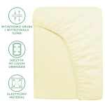 Prześcieradło frotte z gumką 180x200 w kolorze kremowym, leżące na gładkim tle. Widoczna elastyczna guma obszyta po całym obwodzie oraz gruba tkanina, podkreślająca wysoką jakość materiału. Idealne do łóżek o wymiarach 180x200 cm.