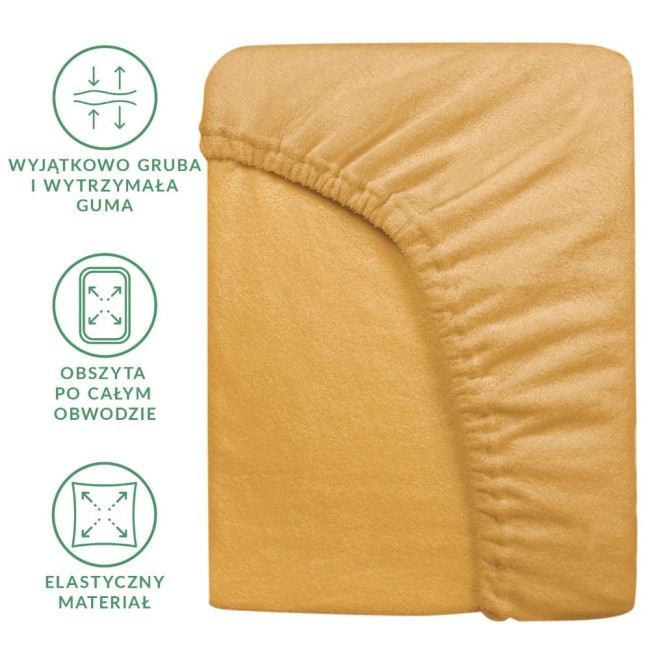 Prześcieradło frotte z gumką w kolorze musztardowym, rozmiar 200x220 cm, leżące na białym tle. Materiał o miękkiej, teksturowanej powierzchni, z widoczną elastyczną gumą obciążoną wokół krawędzi.
