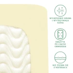 Prześcieradło satynowe z gumką w kolorze kremowym, rozmiar 180x200. Produkt leży na białym tle, ukazując fakturę materiału oraz elastyczną, obszytą guma wokół krawędzi.