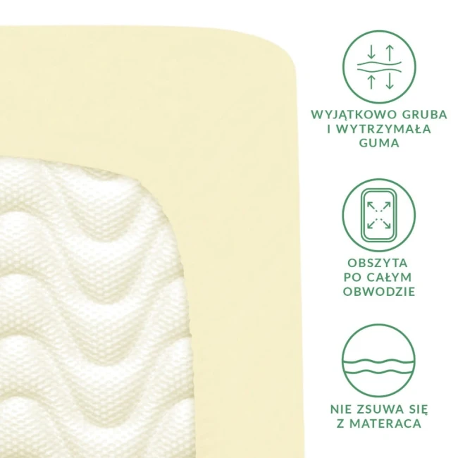 Prześcieradło satynowe z gumką w kolorze kremowym, rozmiar 180x200. Produkt leży na białym tle, ukazując fakturę materiału oraz elastyczną, obszytą guma wokół krawędzi.