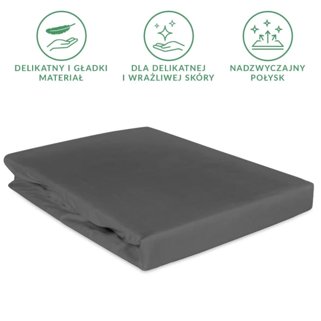 Szare prześcieradło satynowe z gumką o wymiarach 200x220 cm, leżące na płasko. Materiał gładki i delikatny, przeznaczone dla wrażliwej skóry. Widoczne logo i ikony informujące o właściwościach tkaniny.