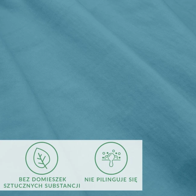Prześcieradło jersey z elastanem w kolorze niebieskim, rozmiar 200x220 cm. Materiał gładki, elastyczny, z widoczną gumką. W dolnej części umieszczono informacje o braku domieszek sztucznych substancji oraz odporności na piling.