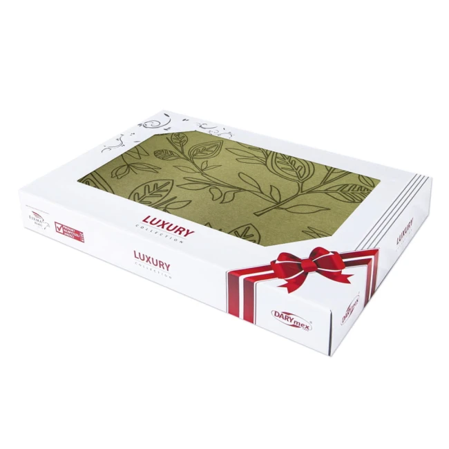 Pościel satyna bawełniana 220x200 w kolorze zielonym, opakowana w pudełko z przezroczystą pokrywą, z dekoracyjnym wzorem liści. Na opakowaniu widoczny napis LUXURY COLLECTION oraz wstążka w czerwono-białe paski z kokardą.