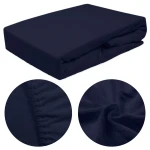 Prześcieradło frotte z gumką w kolorze ciemnego granatu, rozłożone, z widokiem na teksturę materiału. Zbliżenia pokazują elastyczną gumkę oraz delikatną fakturę, idealne dla łóżka o wymiarach 120x200. Tło proste, uwydatniające produkt.