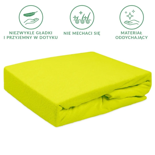Prześcieradło frotte z gumką w kolorze limonkowym, leżące na białym tle. Produkt o wymiarach 60x120 cm, rozłożony w celu wyeksponowania faktury miękkiego materiału, z widoczną gumką na brzegach, zapewniającą lepsze trzymanie na materacu.
