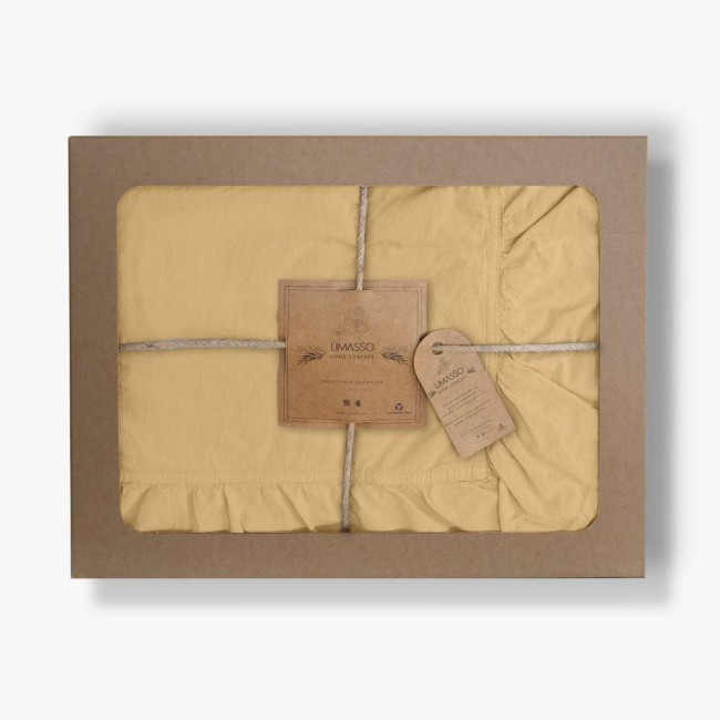 Pościel bawełniana z falbanką 220x200 Stonewashed Exclusive, Soybean, kremowa, zapakowana w tekturowe opakowanie z juty. Widoczna metka z logo Limasso, z ręcznie związanym sznurkiem.