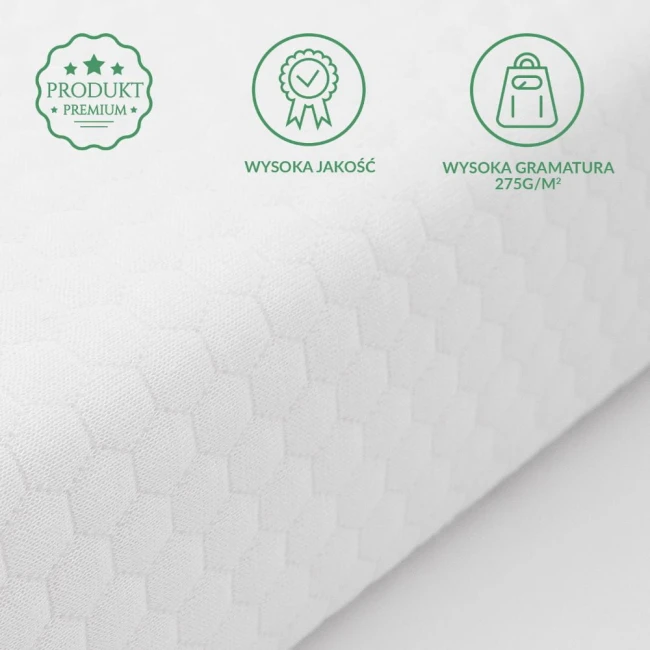 Ochraniacz na materac 70x140 w kolorze białym, pikowany w układzie heksagonalnym. Zbliżenie na fakturę materiału o wysokiej gramaturze 275 g/m², prezentujący jego wytrzymałość i jakość. Elementy graficzne z informacjami o produkcie w lewym górnym rogu.