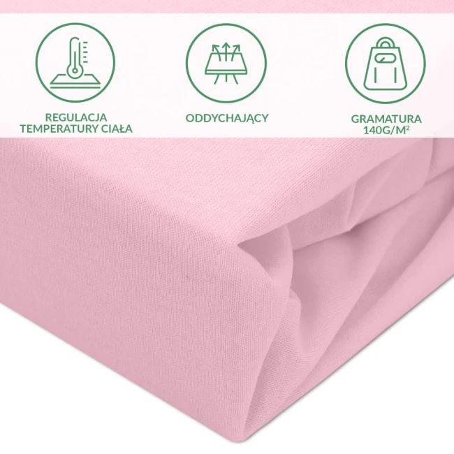 Ochronne prześcieradło z gumką 180x200 w kolorze różowym, wykonane z oddychającego materiału o gramaturze 140 g/m², z fakturą tkaniny widoczną z boku, podkreślającą elastyczne wykończenie.