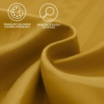 Pościel satyna bawełniana w geometrycznym wzorze w kolorze żółtym, ukazująca teksturę materiału. Zdjęcie w zbliżeniu na fałdy tkaniny, podkreślające gładkość i trwałość kolorów, z czytelnymi napisami o dbałości o szczegóły.