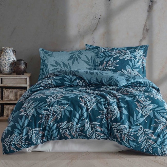  Delikatna, ekskluzywna pościel z makosatyny bawełnianej z liściastym wzorem na niebieskim tle w rozmiarze 220x200 cm 