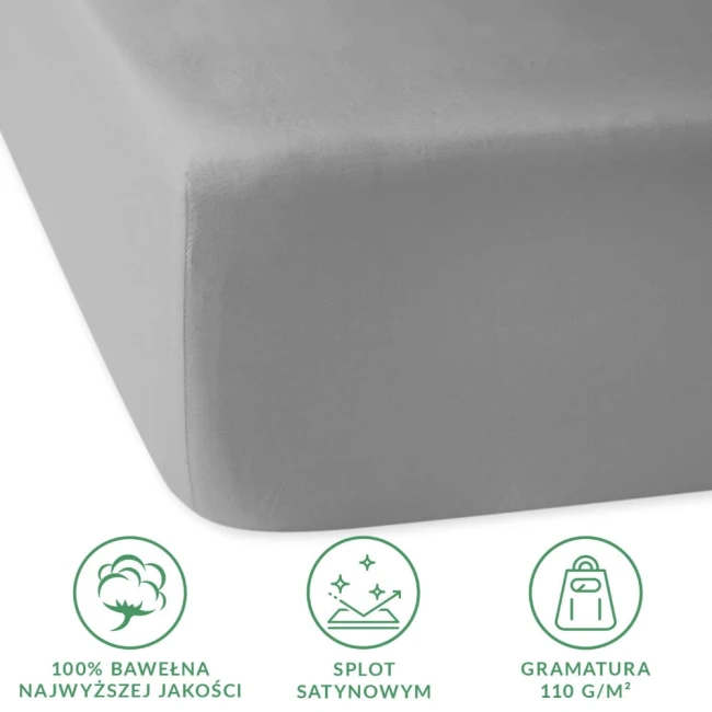 Prześcieradło satynowe z gumką 120x200 w kolorze popielatym, wykonane100% z bawełny, z matową, gładką teksturą. Produkt leży na białym tle, z widoczną gumką oraz etykietą informacyjną o materiałach. Wymiary: 120x200 cm.