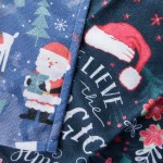 Ścierka kuchenna Christmas w komplecie 2 sztuki, rozmiar 38x60 cm. Wzór z Świętym Mikołajem oraz reniferami na tle granatowym i ciemnym, z napisem BELIEVE in the Magic. Miękka, teksturowana tkanina, idealna do świątecznej aranżacji.