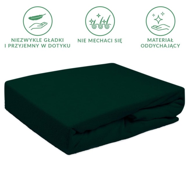 Prześcieradło frotte z gumką 160x200 w kolorze zieleni butelkowej, leżące na jednolitym tle. Widać jego gładką fakturę oraz gumkę na brzegach, zapewniającą idealne dopasowanie. Produkt o wysokiej jakości, odpowiedni do łóżek o wymiarach 160x200.