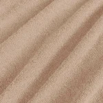 Pościel frotte 160x200 w kolorze beżowym, o miękkiej, teksturowanej fakturze, ułożona w złożeniu, ukazująca subtelne wzory i delikatne załamania materiału. Tło proste, co podkreśla kolor i strukturę tkaniny.