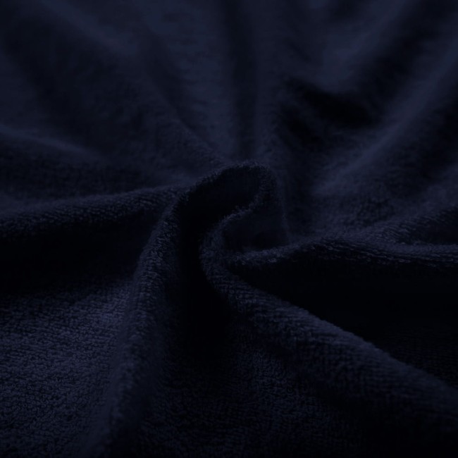 Pościel frotte w kolorze ciemnego granatu, wykonana z miękkiego materiału, leżąca w złożeniu. Widoczna struktura frotte, delikatnie teksturowana, bez dodatkowych wzorów czy napisów. Idealna do użytku na łóżku o wymiarach 200x220 cm.