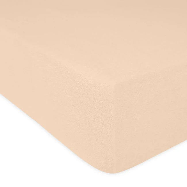 Prześcieradło frotte z gumką w kolorze różu perłowego, o wymiarach 90x200 cm, leżące na gładkiej powierzchni. Widoczna jest jego faktura oraz elastyczna gumka, dopasowująca się do materaca. Produkt na jednolitym tle, bez widocznych inscription.