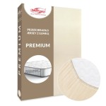 Prześcieradło jersey z gumką w kolorze jasnym beżu, pakowane w kartonowe opakowanie. W zbliżeniu widoczna faktura materiału oraz gumka zabezpieczająca. Oznaczenie PREMIUM oraz informacja o dopasowaniu do materaca o wysokości do 25 cm na opakowaniu.