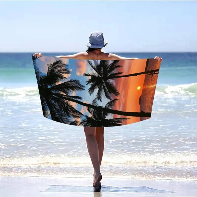 Ręcznik plażowy 100x180 Palmy o zachodzie słońca szybkoschnący z mikrofibry duży