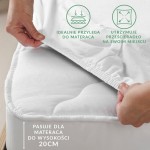 Prześcieradło flanelowe z gumką w kolorze kremowym, rozmiar 120x200 cm, leży na materacu. Widoczne są gumki po bokach, które zabezpieczają je na miejscu. W tle neutralne, jasne otoczenie. Napis informuje o dopasowaniu do materaca o wysokości 20 cm.