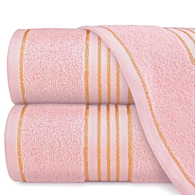 Komplet ręczników z bawełny w eco pudełku kolor jasno różowy z bordiurą w złote paski 500 g/m2 TIWANO 2 kpl.