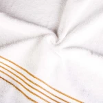 Komplet ręczników z bawełny w eco pudełku kolor biały z bordiurą w złote paski 500 g/m2 TIWANO 3 kpl.