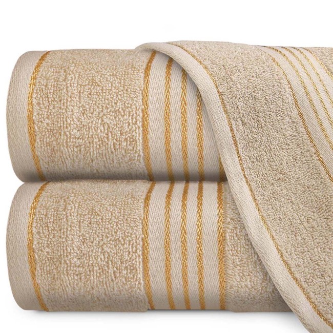 Komplet ręczników z bawełny w eco pudełku beżowy i czarny z bordiurą w złote paski 500 g/m2 TIWANO 4 kpl.