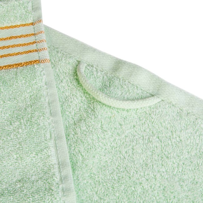 Komplet ręczników z bawełny w eco pudełku krem i jasny zielony z bordiurą w złote paski 500 g/m2 TIWANO 4 kpl.